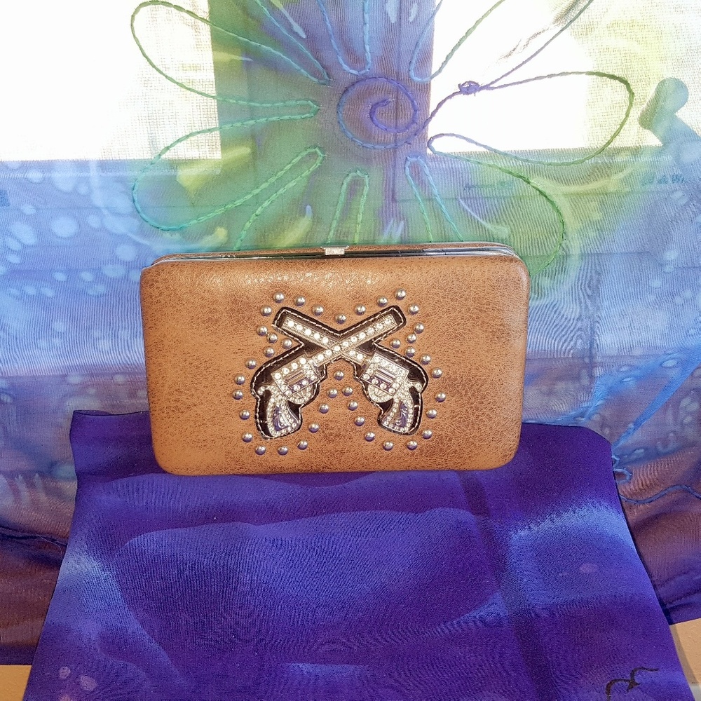 Montana west six shooter rhinestone wallet.